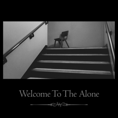 A chair stands by itself at the top of a flight of stairs.